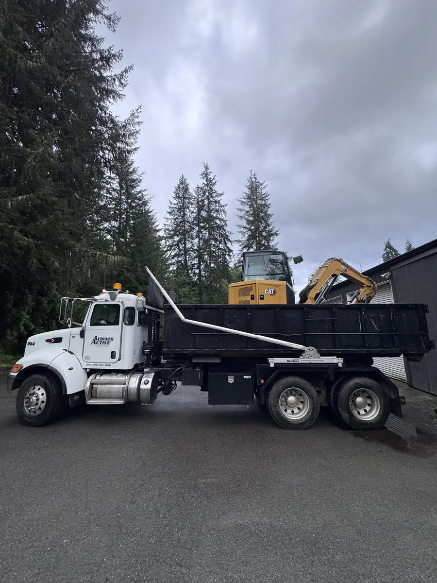 Hauling a mini excavator between jobs