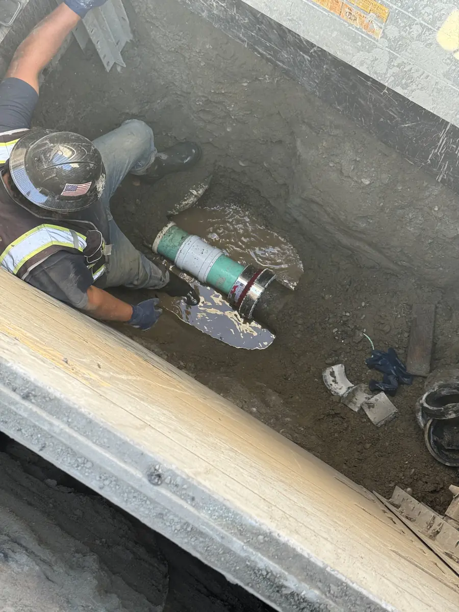 Connecting sewer pipe below grade