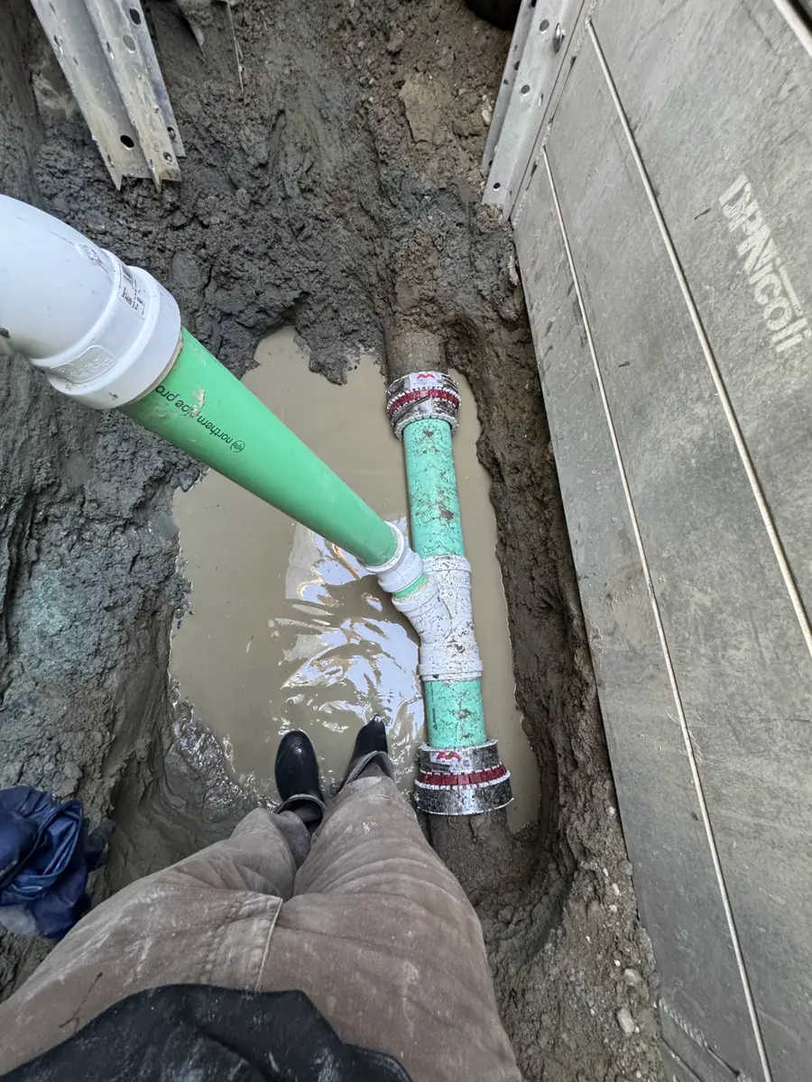 New underground pipe with a protective trench box