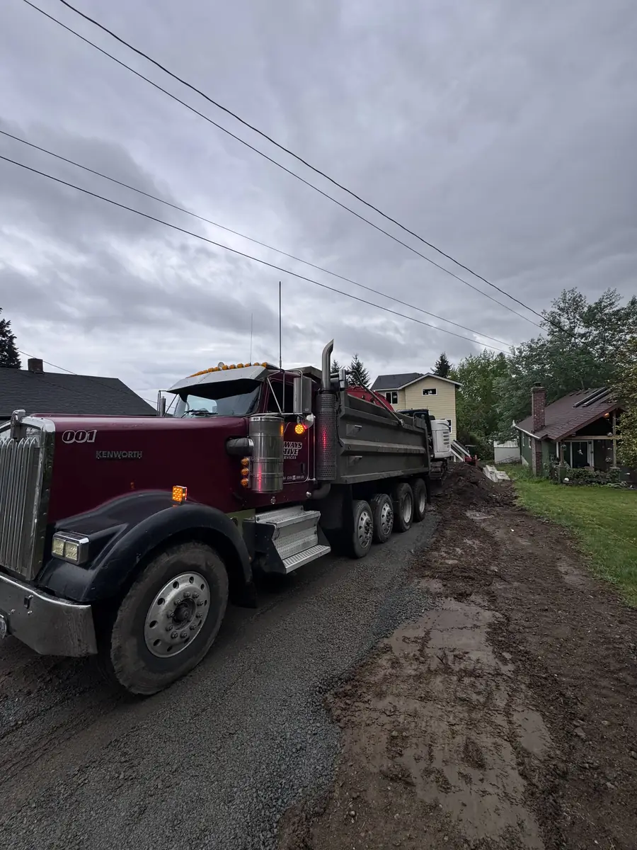 Grading and hauling on a residential road